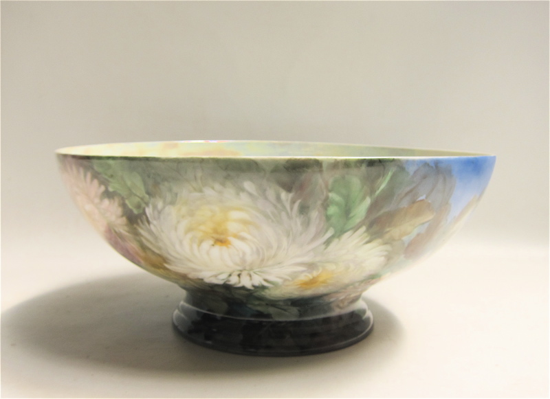 Appraisal: HAND PAINTED PORCELAIN PUNCH BOWL artist signed underfoot with chrysanthemum