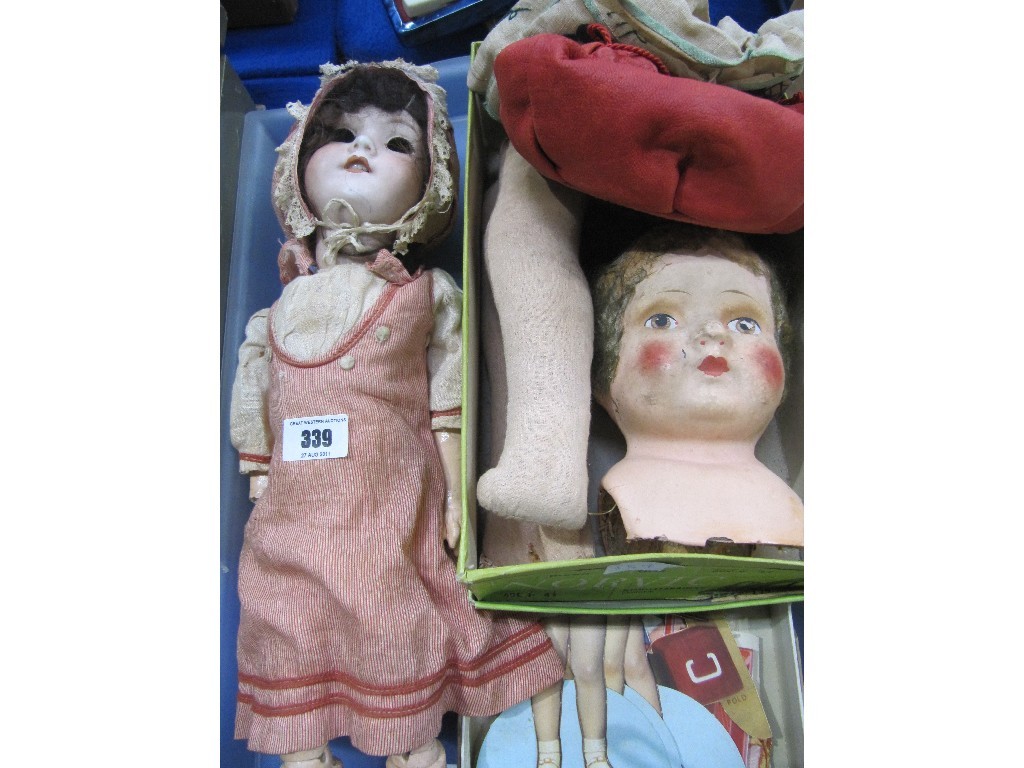 Appraisal: Lot comprising girl doll by Armande Marseilles doll in part