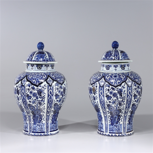 Appraisal: Pair of Chinese blue and white covered porcelain vases with