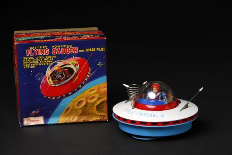 Appraisal: Tin Flying Saucer Battery-Operated Toy Description Japanese Marked KO and