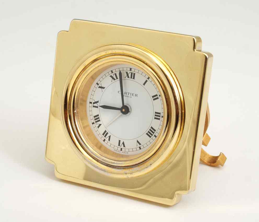 Appraisal: CARTIER LES MUST TRAVEL CLOCK IN CASE Brass case clock