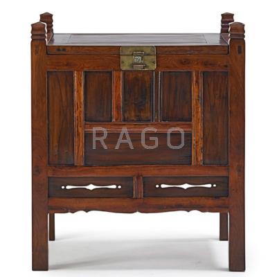 Appraisal: CHINESE LIFT TOP COMMODE Mixed woods with paneled sides th