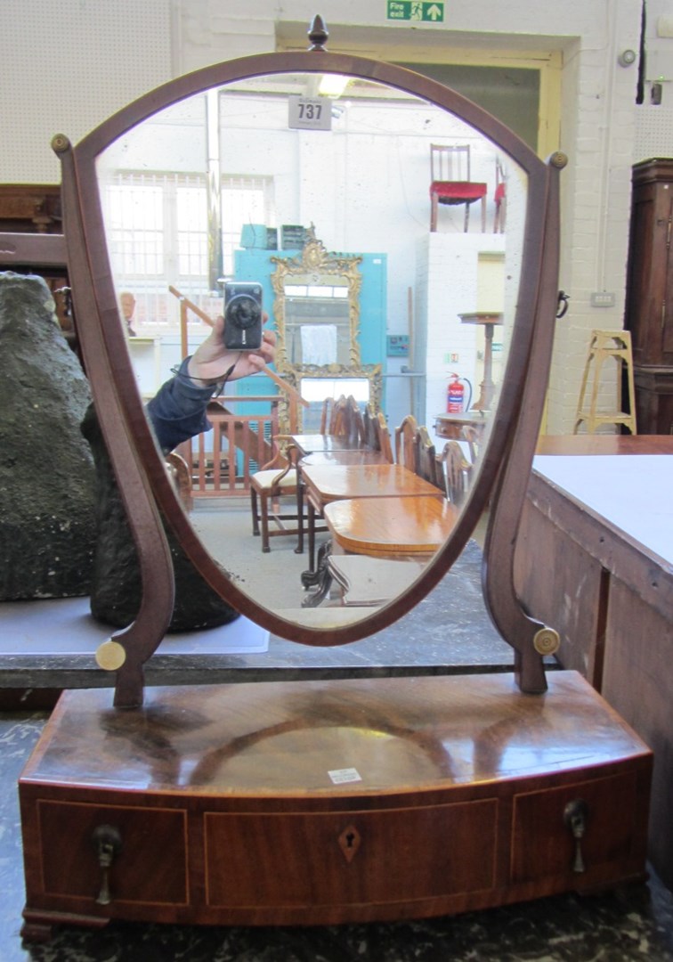 Appraisal: A th century inlaid mahogany dressing table mirror with bow