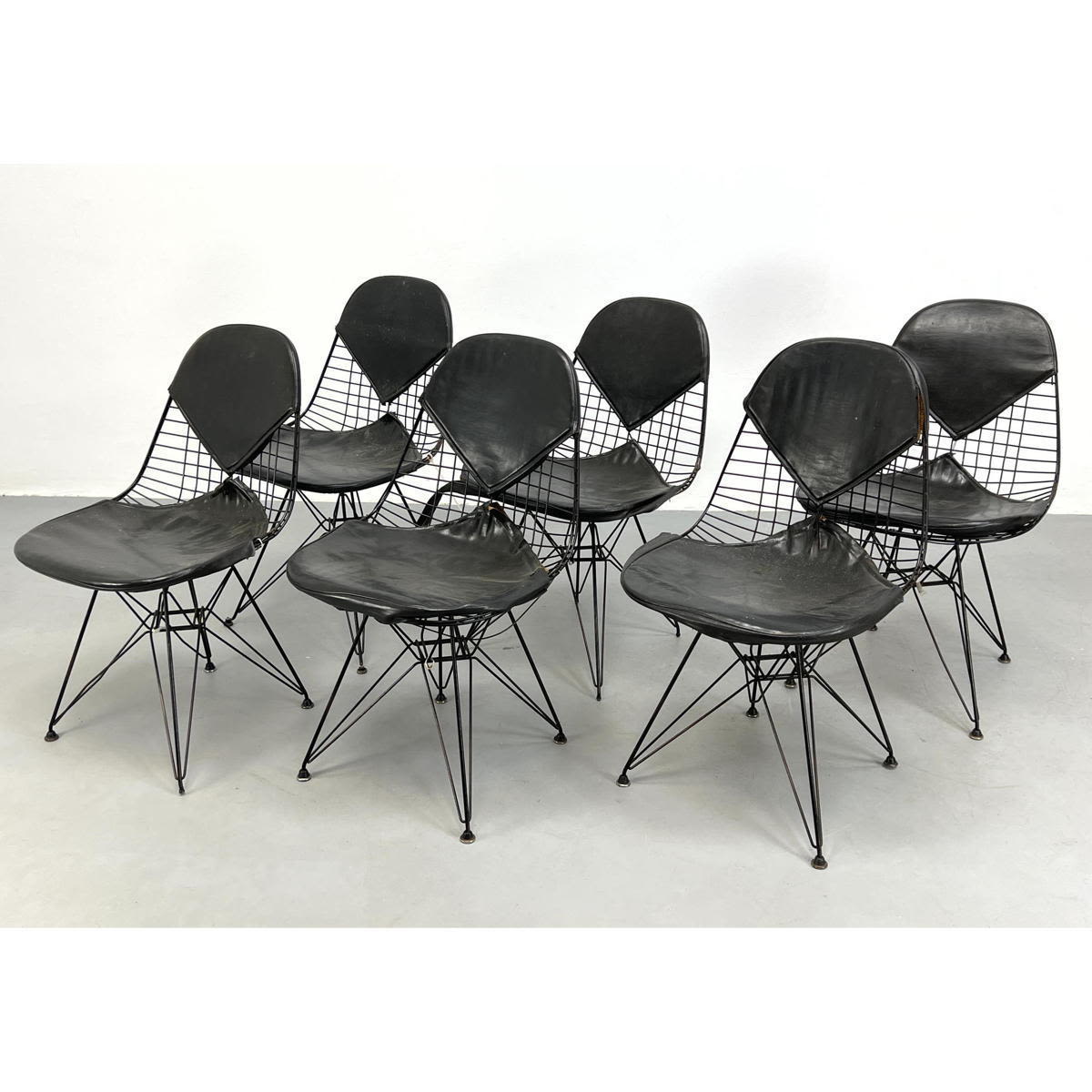 Appraisal: early Eames wire chairs with bikini and Eiffel Tower base