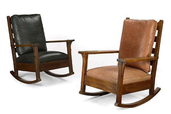 Appraisal: A pair of Gustav Stickley upholstered oak rocking chairs model