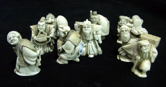 Appraisal: Eight Japanese ivory and bone figural netsukes depicting various fisherman