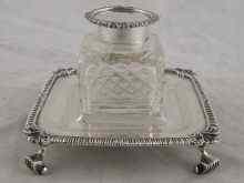 Appraisal: A silver ink stand hallmarked London with cut glass bottle