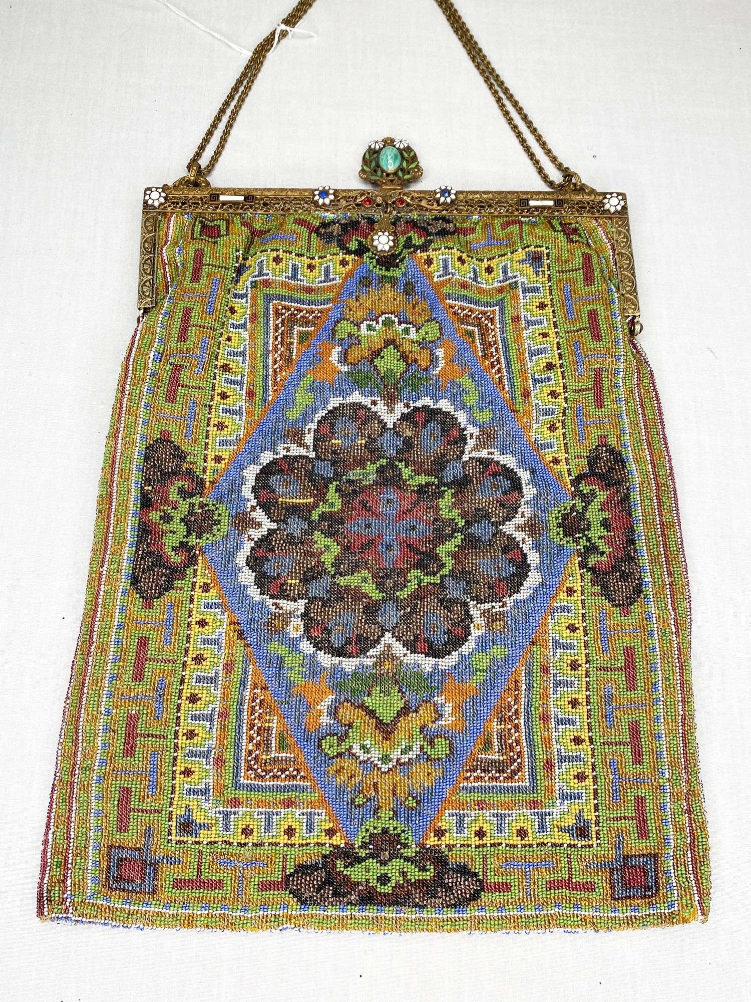 Appraisal: Micro Beaded Purse with Carpet Design and Enameled Frame Long