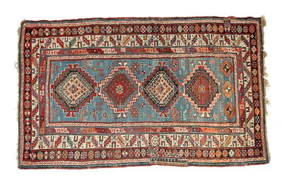 Appraisal: ORIENTAL RUG Kazak Multiple borders and blue ground Patch '