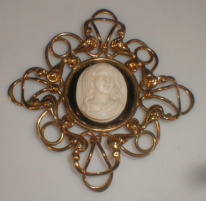 Appraisal: An Art Nouveau carved ivory cameo plaque of a girl's