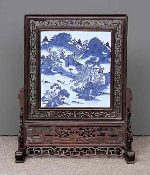 Appraisal: A Chinese blue and white porcelain rectangular panel and hardwood