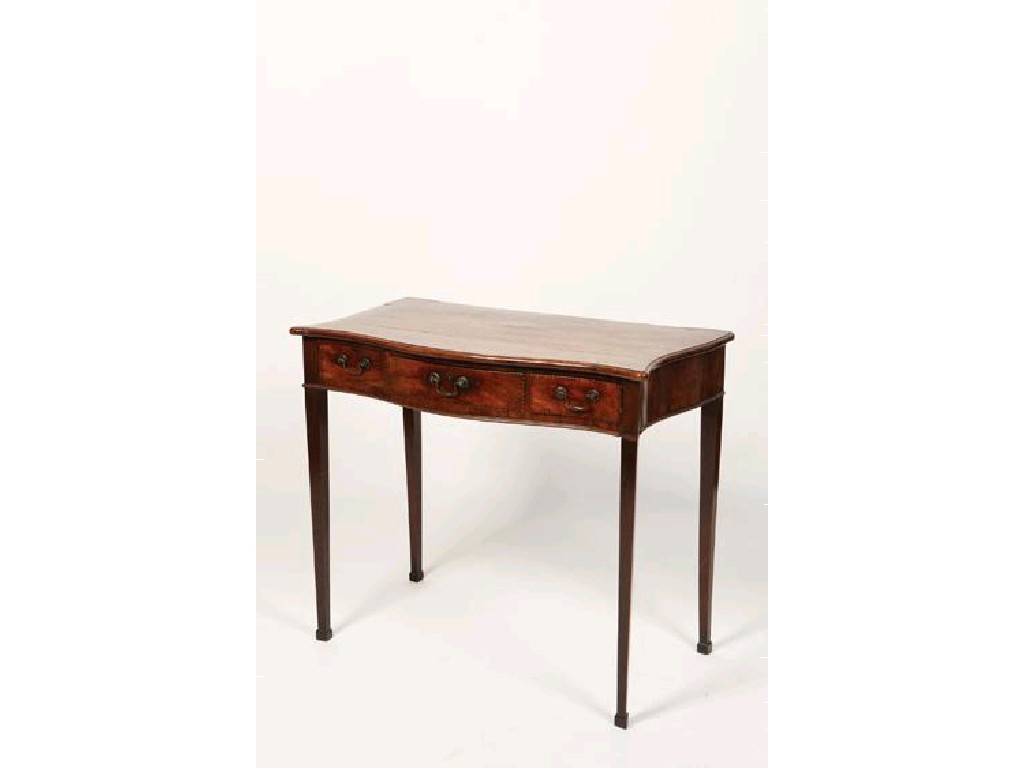 Appraisal: A GEORGE III MAHOGANY SERPENTINE SIDE TABLE the top with