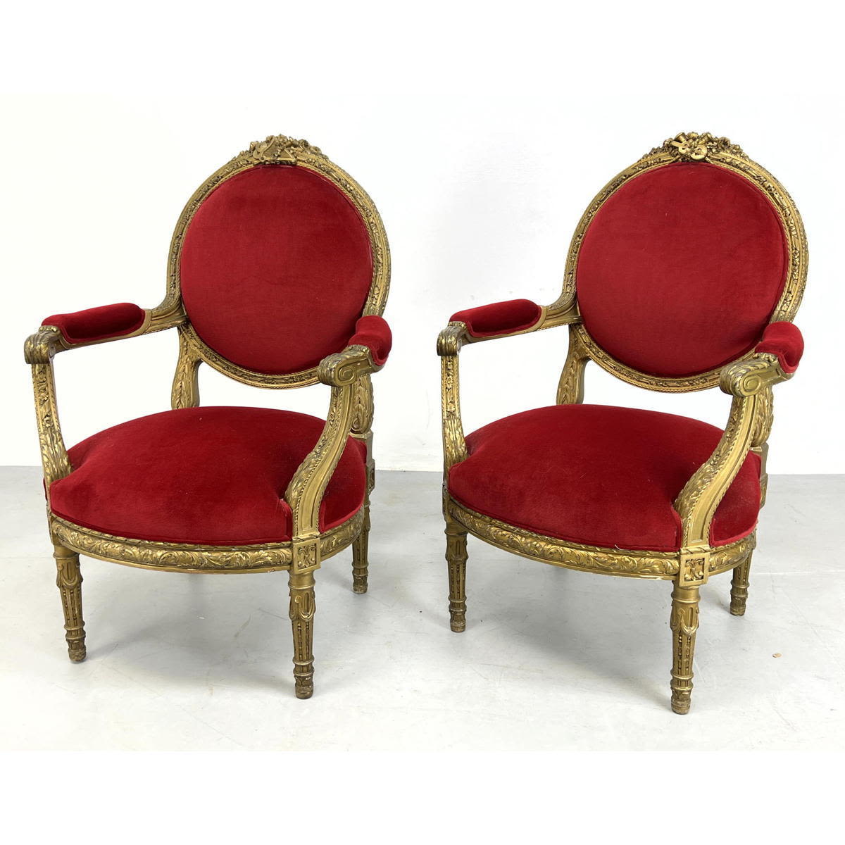 Appraisal: Pair French LOUIS XVI Style Fauteuil Chairs Carved frames Gilt