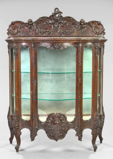 Appraisal: Louis XV-Style Dark-Stained China Cabinet ca with a scalloped and