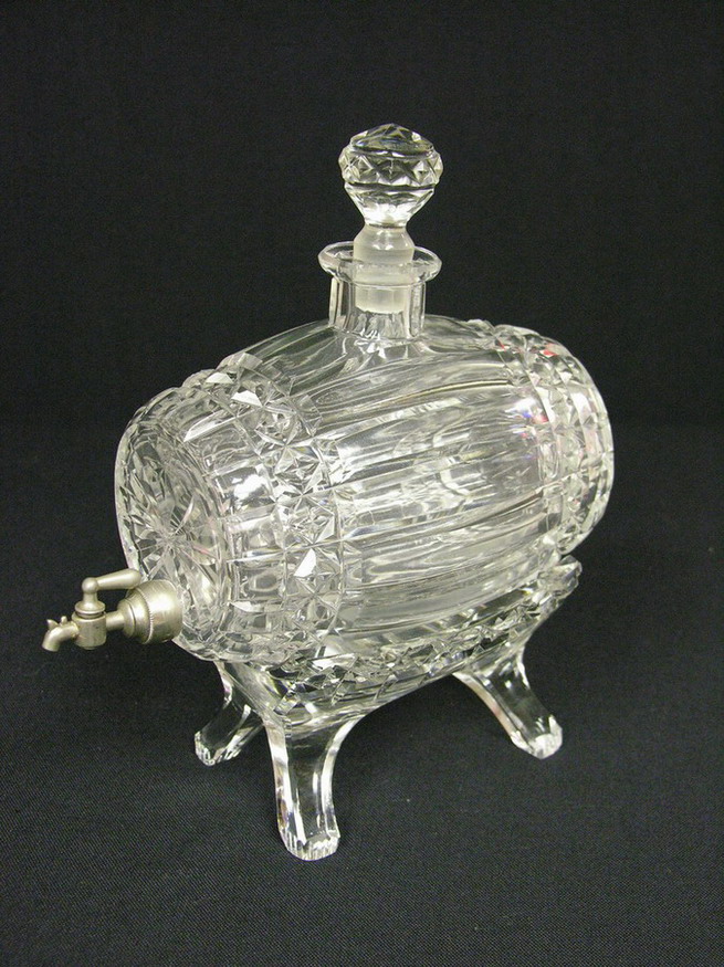 Appraisal: CUT CRYSTAL WHISKEY BARREL DECANTER Barrel with tap rests on