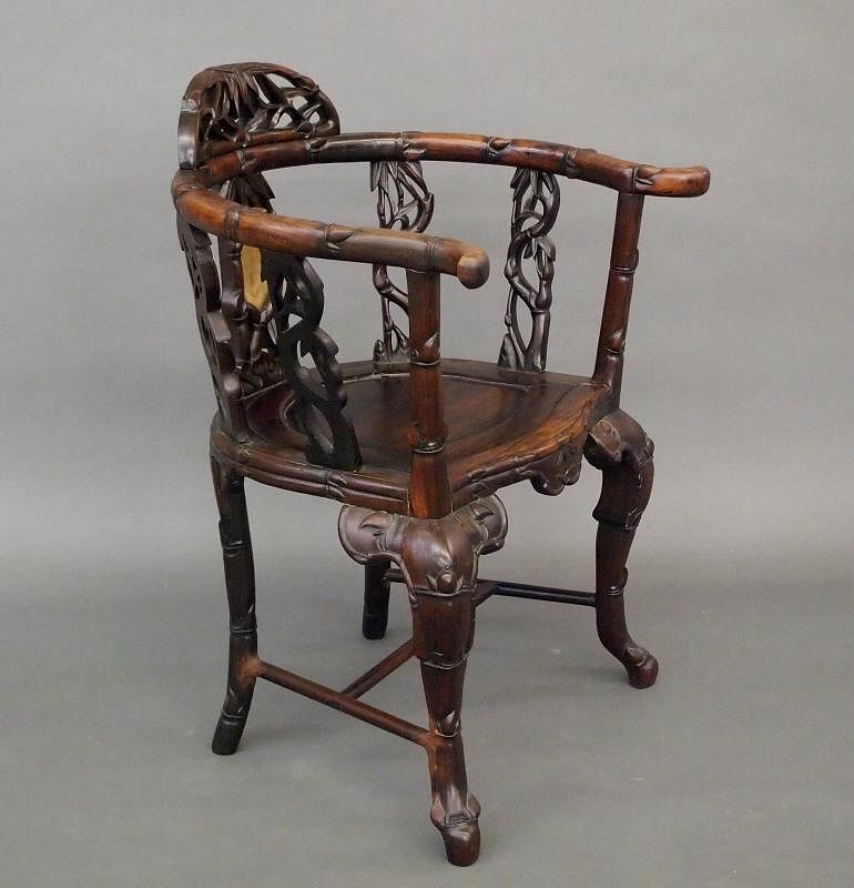 Appraisal: Chinese rosewood armchair An early th century Chinese rosewood armchair