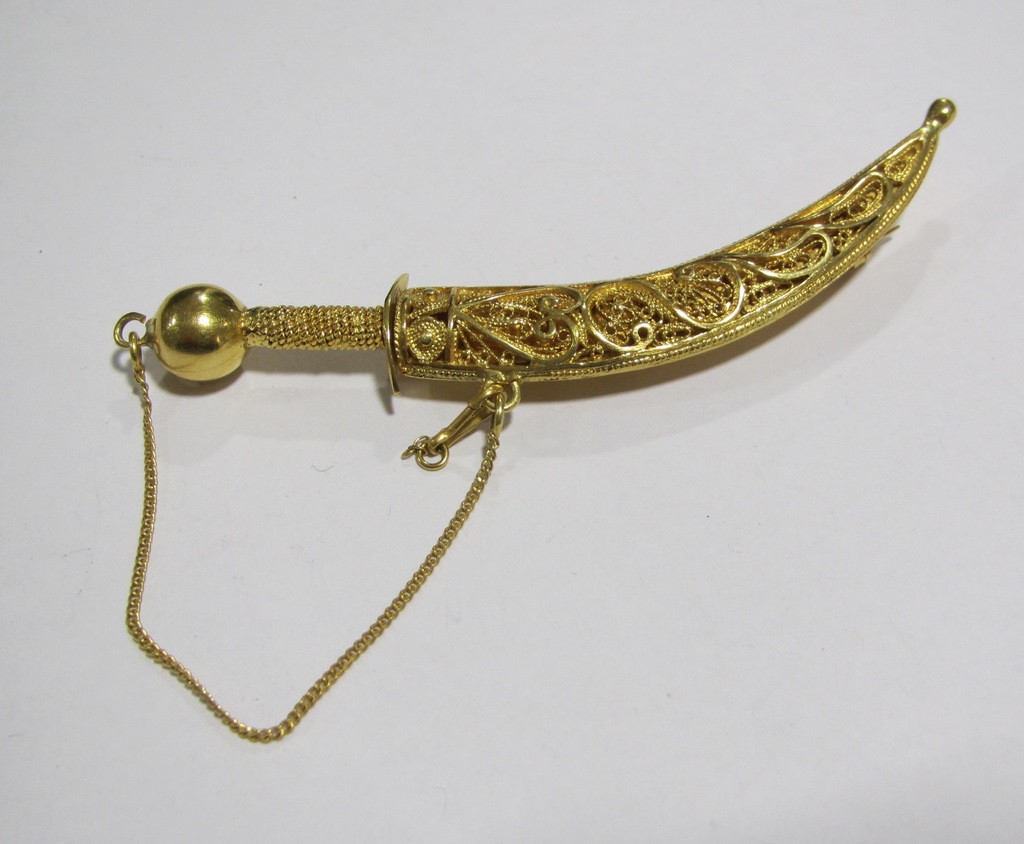 Appraisal: African gold filigree work brooch in the form of a