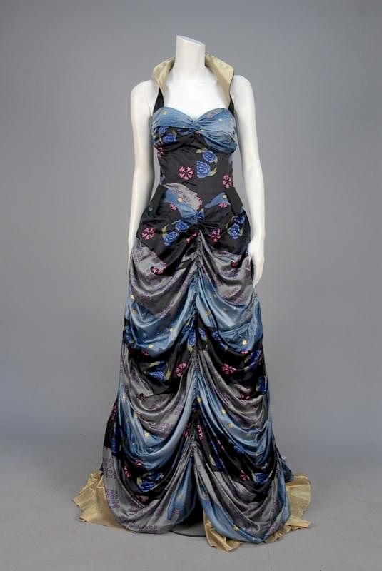 Appraisal: FLORAL PRINTED BALLGOWN Semi-boned sweetheart bodice with lame halter front