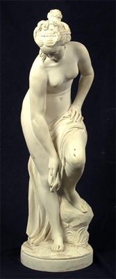 Appraisal: A carved marble figure of a female bather on a