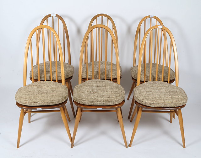 Appraisal: A SET OF SIX LIGHT ELM ERCOL SPINDLEBACK KITCHEN CHAIRS