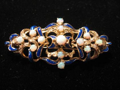 Appraisal: Opal and blue enamel brooch s Decorative brooch featuring cabochon