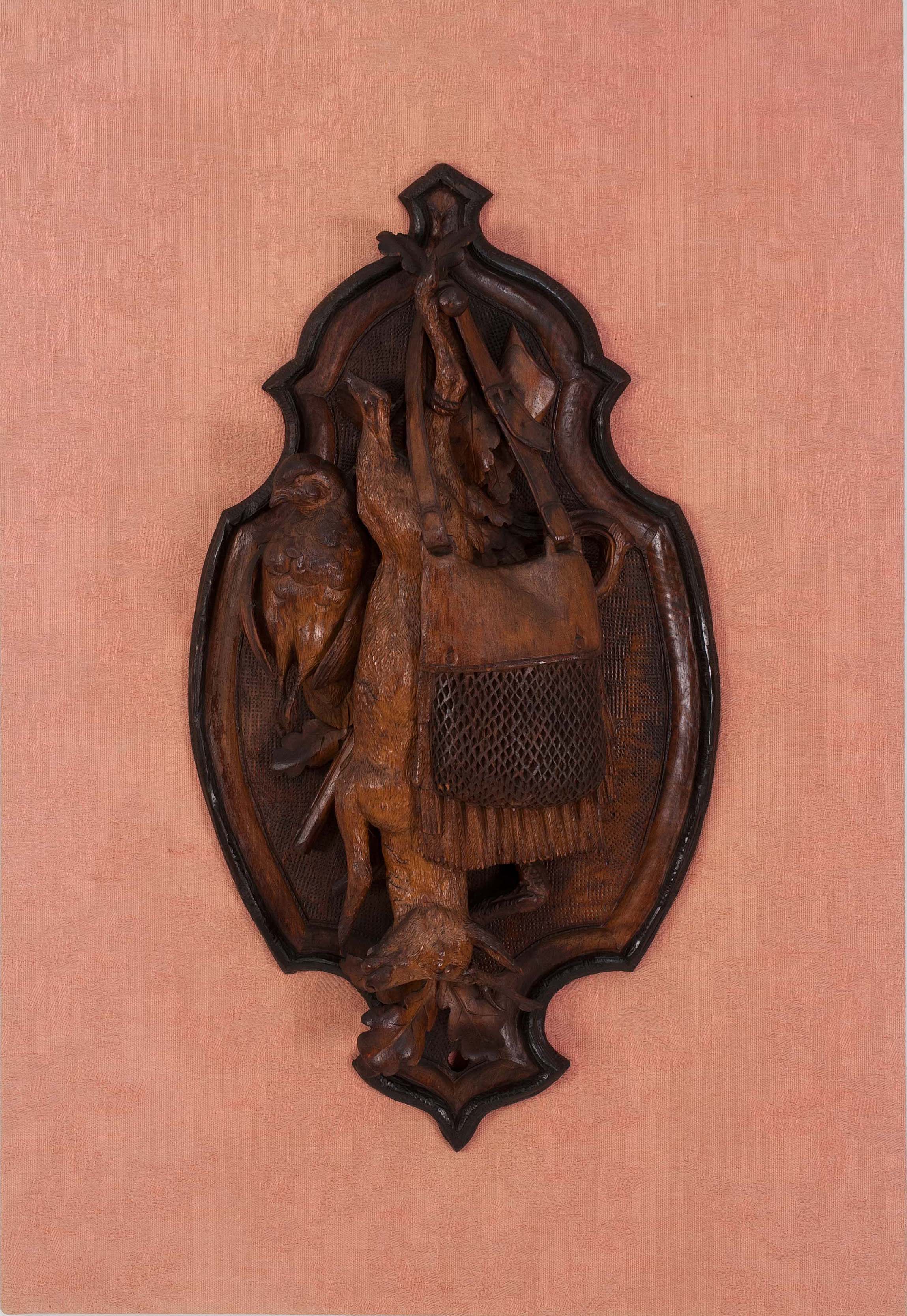 Appraisal: BLACK FOREST CARVING OF HANGING GAME Circa In walnut Depicts