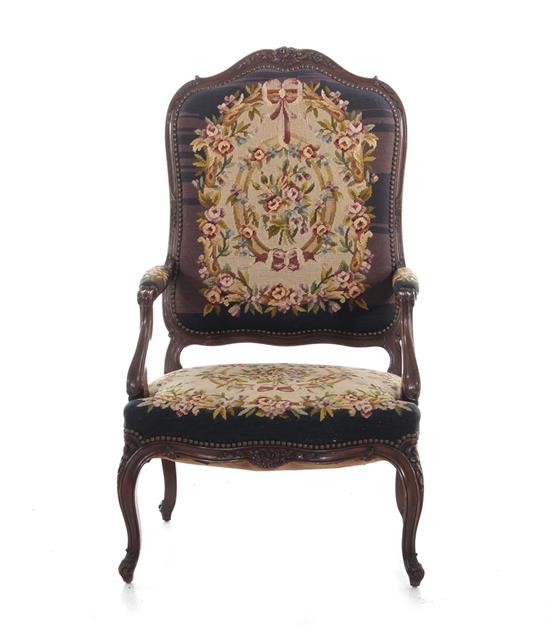 Appraisal: Louis XV style beechwood and needlepoint-upholstered armchair late th century