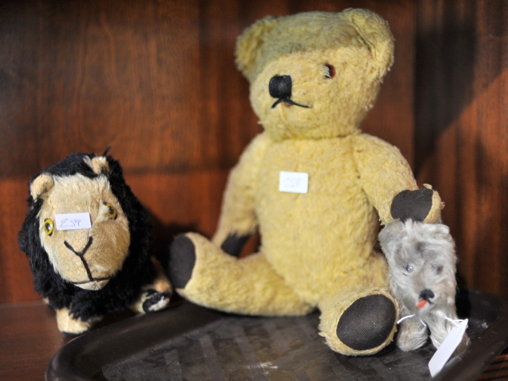 Appraisal: Lot comprising Steiff dog toy lion and a teddy bear