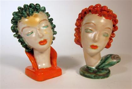 Appraisal: Pair of Goldscheider tin glazed earthenware bustsModeled as flappers with