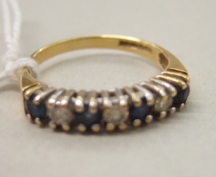 Appraisal: An ct gold sapphire and diamond set seven stone half