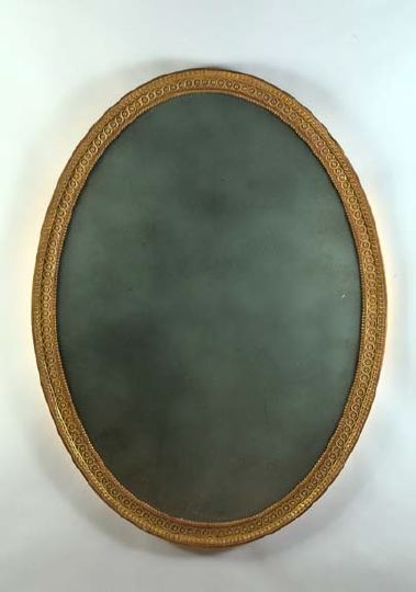 Appraisal: Large Oval English Carved Giltwood Looking Glass in the neoclassical