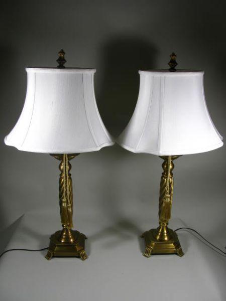 Appraisal: Pair of Brass Decorative Table Lamps elegant twist columns This