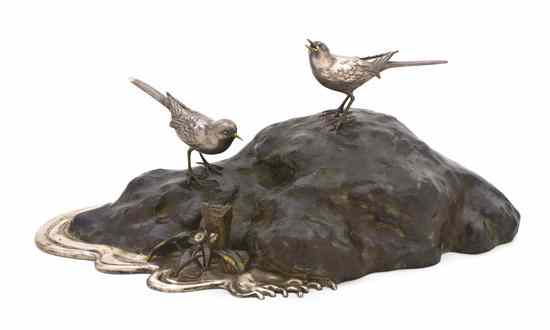 Appraisal: A Japanese Mixed Metal Boulder with Silver Egrets the two