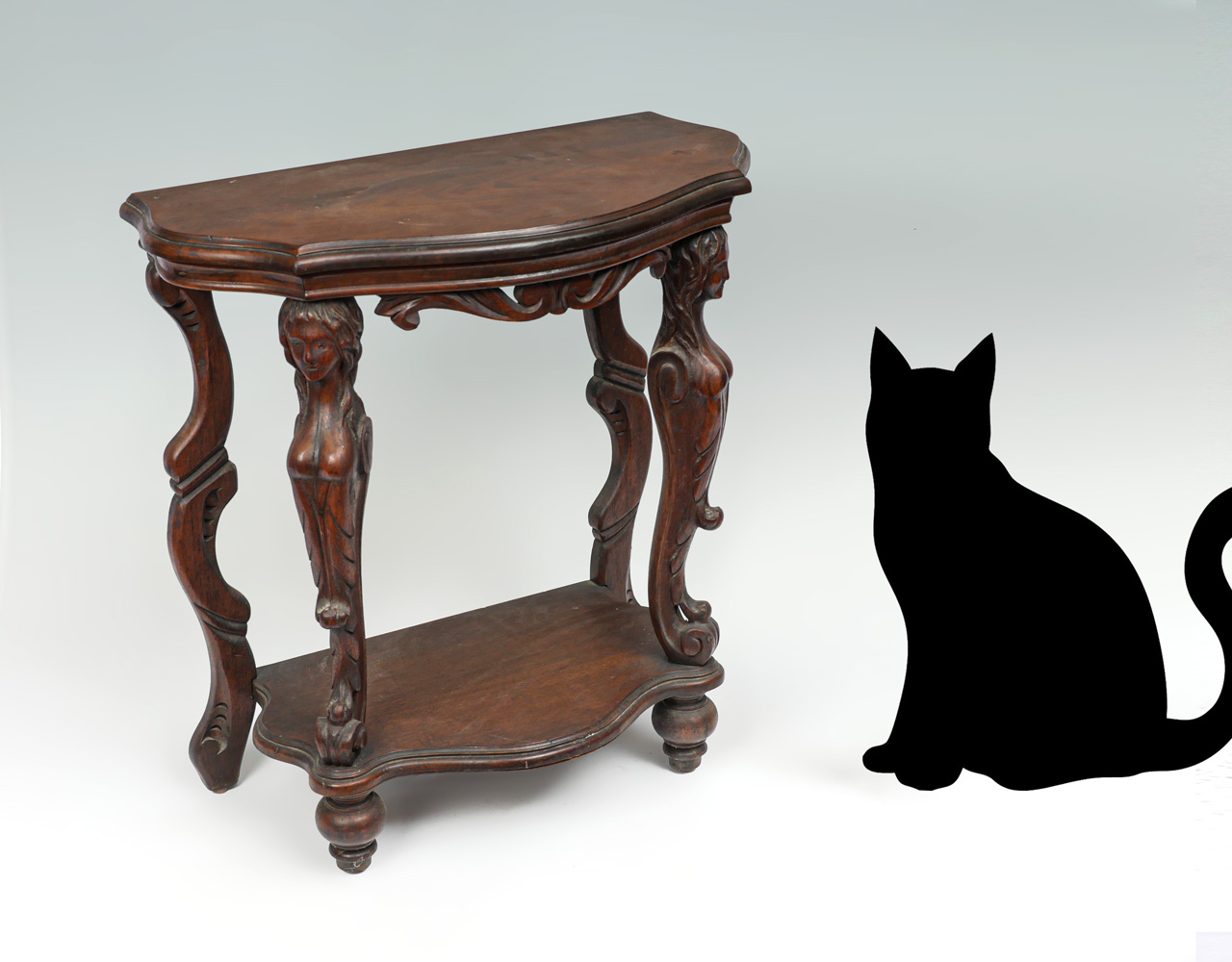 Appraisal: FIGURAL CARVED HALL TABLE Carved hall table having carved semi-nude