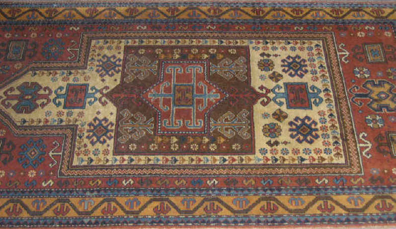 Appraisal: CAUCASIAN DESIGN PRAYER RUG The brown field of geometric design