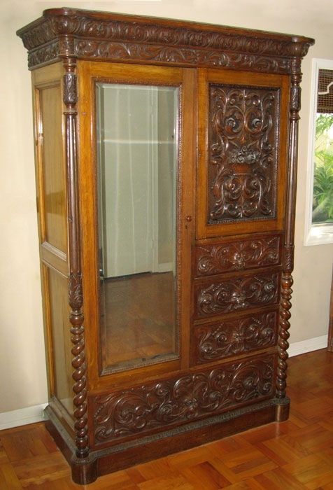 Appraisal: HORNER QUALITY HEAVILY CARVED OAK ARMOIRE Featuring griffin head carved