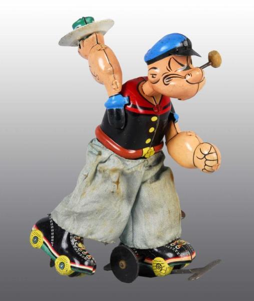 Appraisal: Tin Linemar Popeye Skater Wind-Up Toy Description Japanese Working All