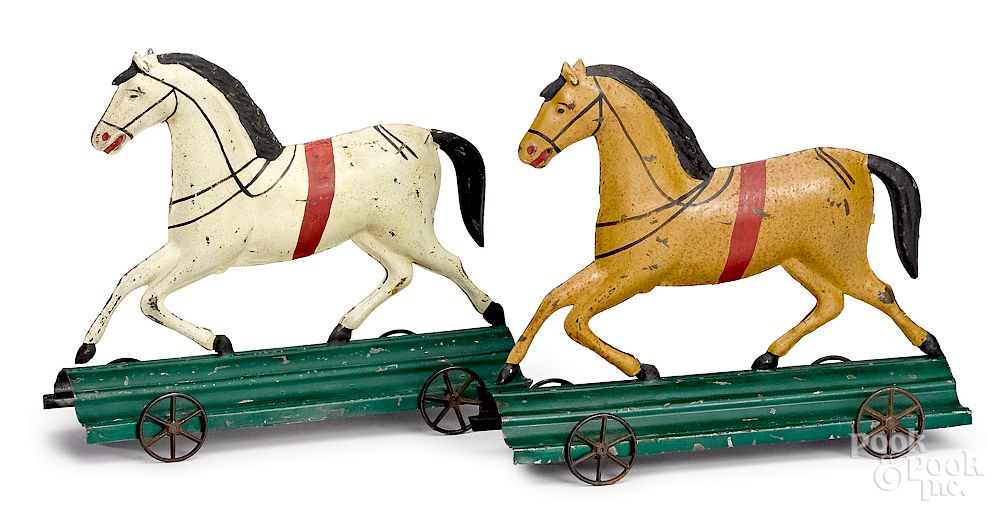 Appraisal: Two Fallows painted American tin horse pull toys Two Fallows