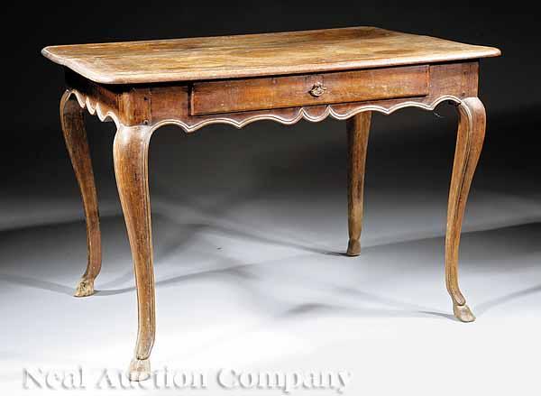 Appraisal: A Provincial Louis XV Carved Walnut Table th c molded