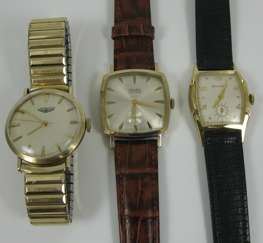 Appraisal: THREE MEN'S VINTAGE WRIST WATCHES Bulova with black leather strap