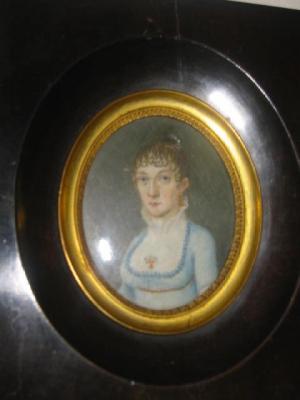 Appraisal: ENGLISH SCHOOL Portrait of a Lady in a pale blue