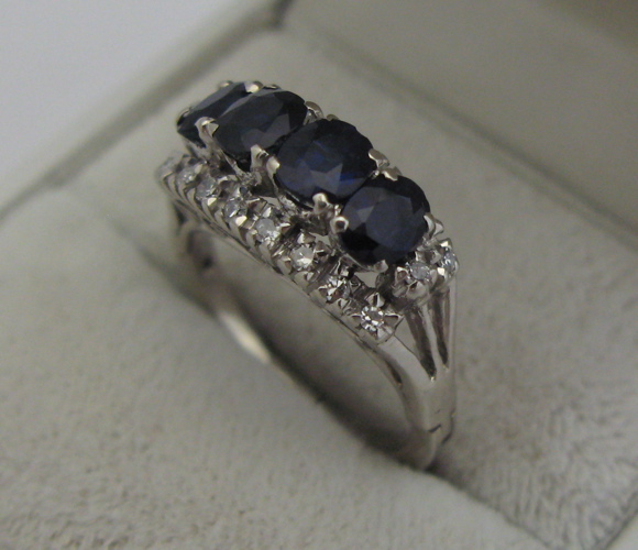 Appraisal: SAPPHIRE DIAMOND AND K WHITE GOLD RING set with four