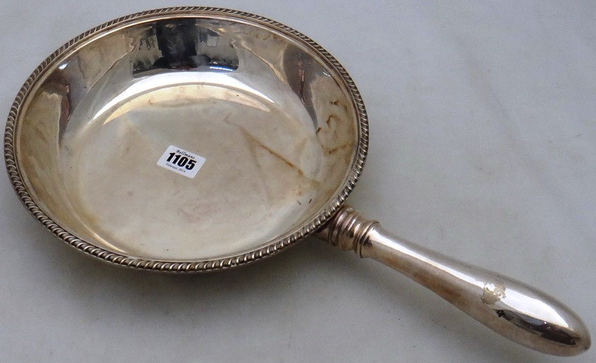 Appraisal: A silver serving dish of circular form decorated with a