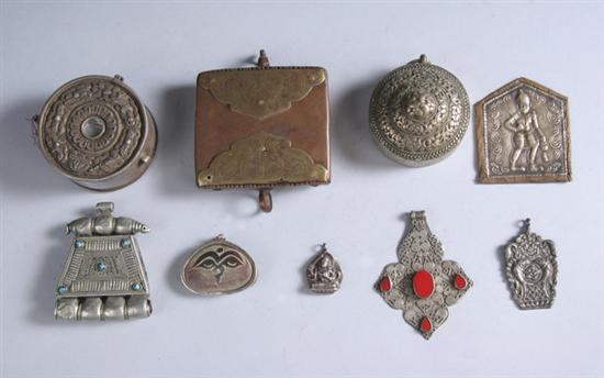 Appraisal: NINE TIBETAN SILVER AND COPPER PENDANTS AND PLAQUE - Largest