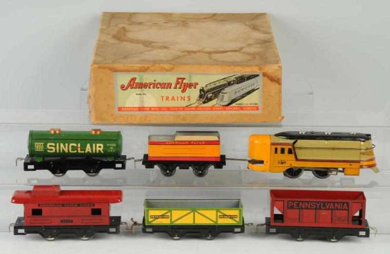 Appraisal: American Flyer Tinplate O-Gauge Train Set Description Hiawatha style engine