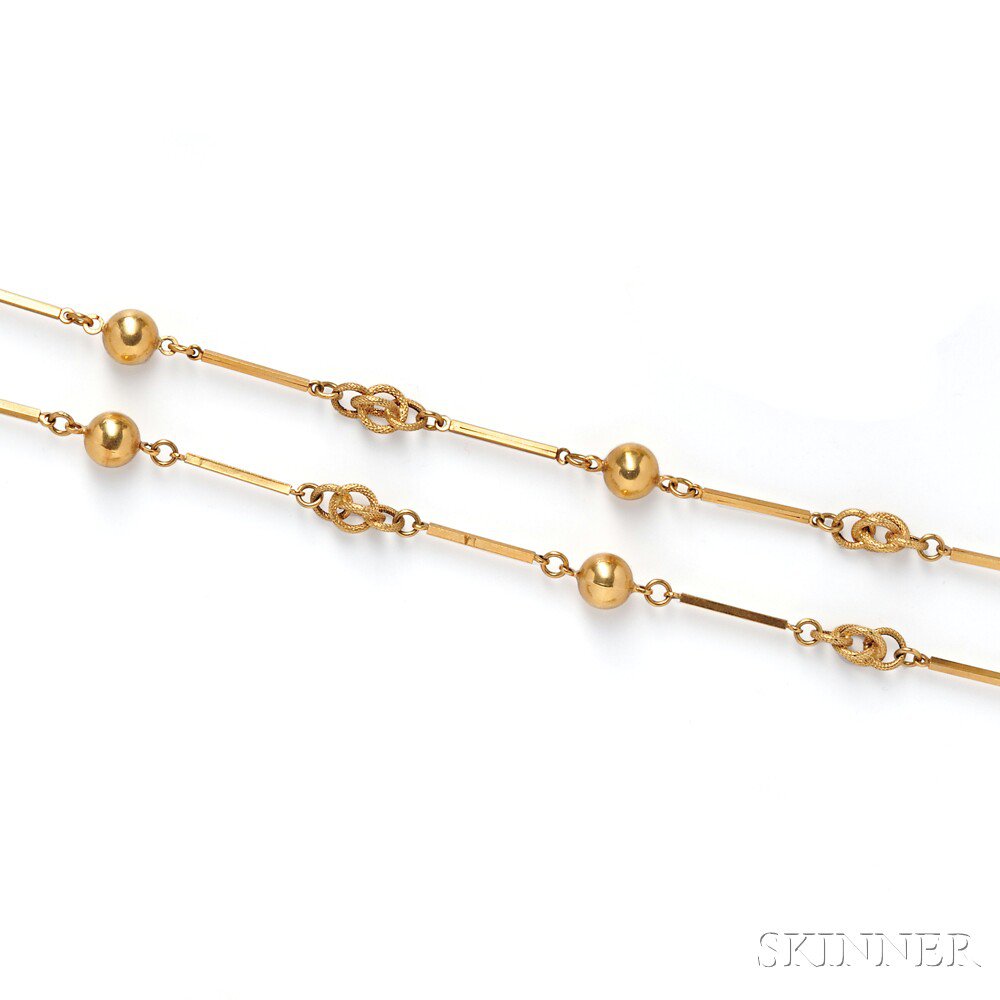 Appraisal: kt Gold Longchain composed of bead knot and baton links