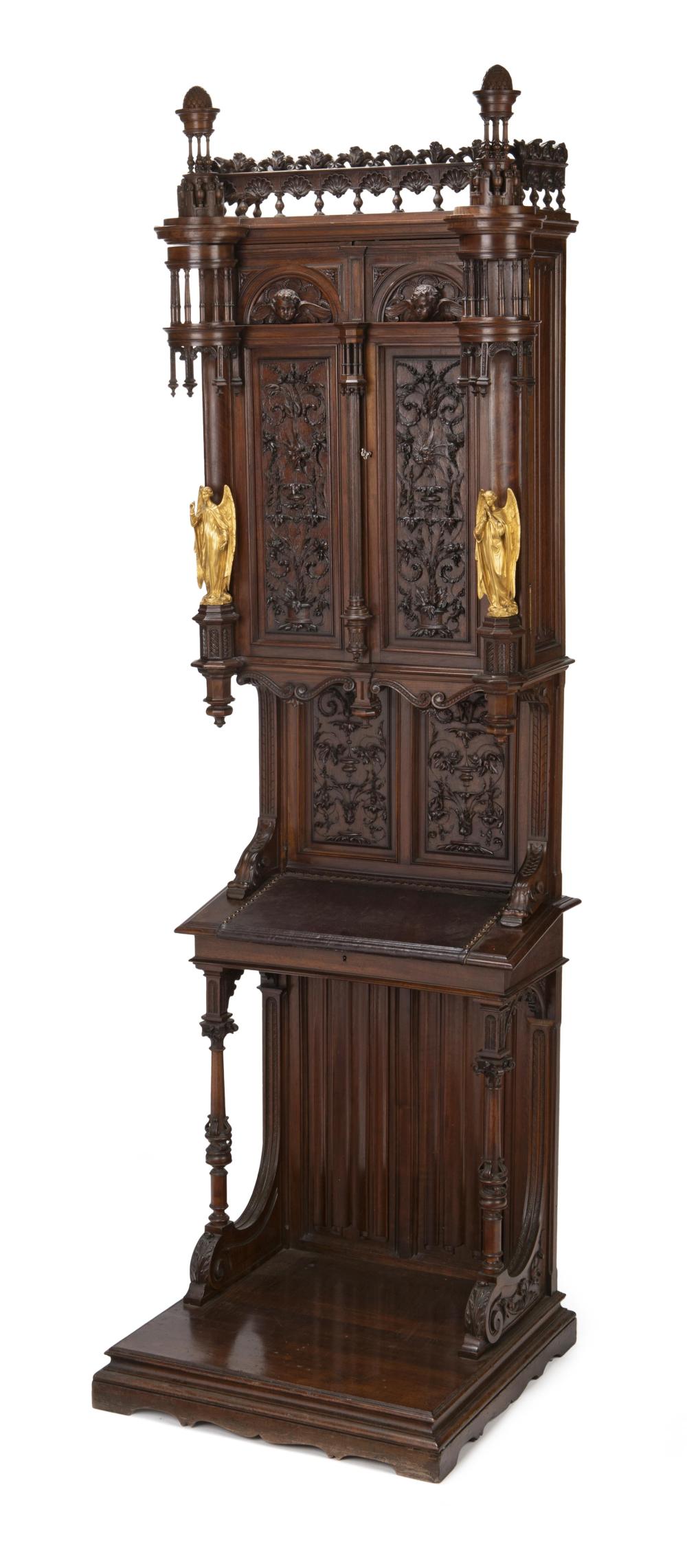 Appraisal: A Gothic-Revival carved reliquery prie-dieu cabinet Third-quarter th Century Elaborately