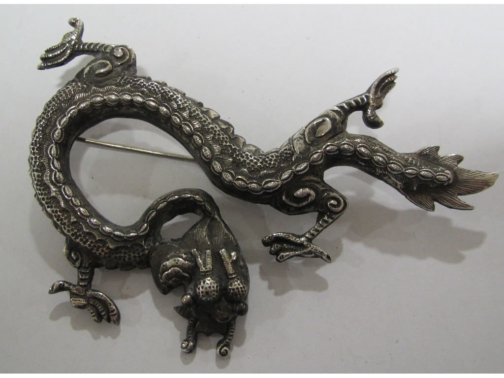 Appraisal: White metal brooch in the form of a dragon