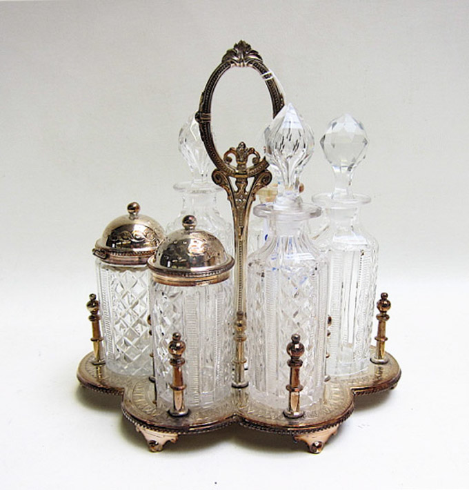 Appraisal: ENGLISH CUT CRYSTAL AND SILVER PLATED CASTOR SET having six