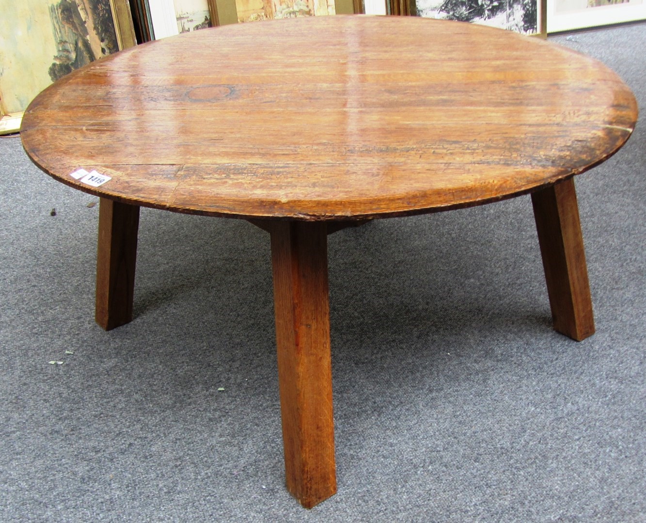 Appraisal: A circular oak occasional table made from the end of